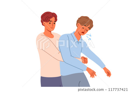 Man performs heimlich maneuver for choking friend, providing first aid to save man Man performs heimlich maneuver for choking friend, providing first aid to save man 117737421