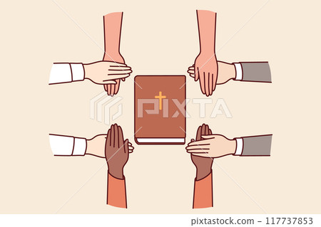 Hands of christian believers held bible, which allows them to commune with lord. Hands of christian believers held bible, which allows them to commune with lord. 117737853
