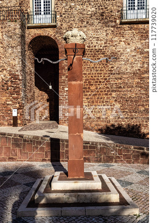 The Pillory, Pelourinho of Silves at the city gate building, Portas da Cidade in the centre of Silves, Portugal The Pillory, Pelourinho of Silves at the city gate building, Portas da Cidade in the centre of Silves, Portugal 117739020