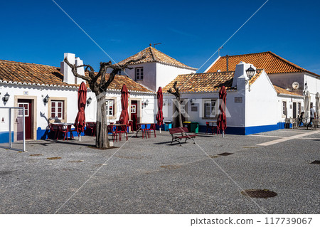 Traditional blue and white Alentejo Portuguese buildings in Porto Covo, Portugal 117739067