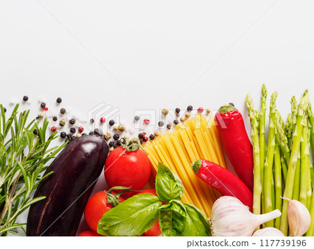 Italian kitchen and italian food concept. Ingredients for pasta isolated one edge. Copy space. Top view 117739196