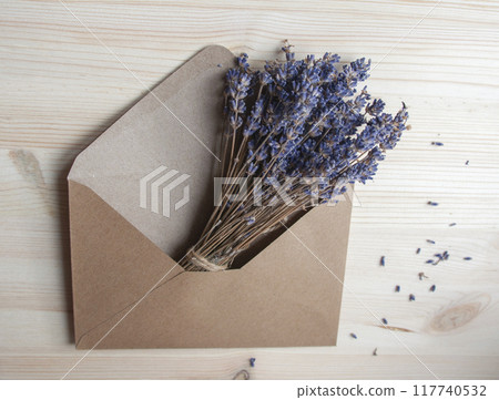 Bright lavander on wooden background with free space 117740532
