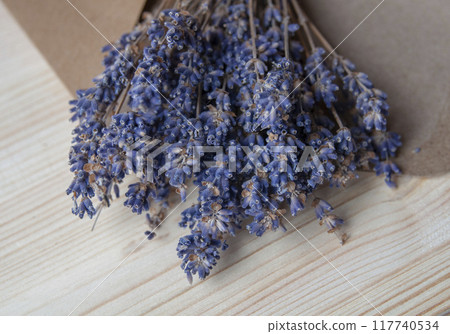Bright lavander on wooden background with free space Bright lavander on wooden background with free space 117740534