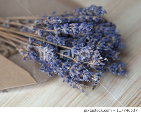 Bright lavander on wooden background with free space 117740537