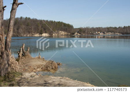 Bright landscape of lake with blue water 117740573