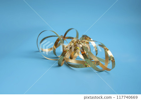 party ribbon confetti on blue 117740669