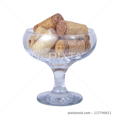 Vintage wine cork in glass on the white background Vintage wine cork in glass on the white background 117740811