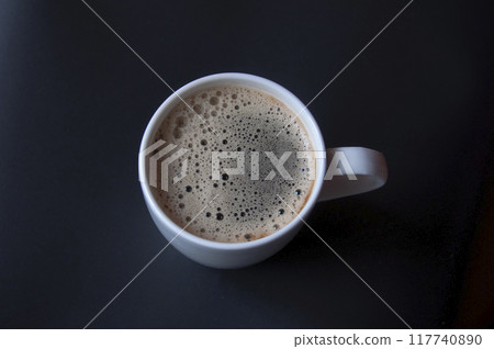 coffee with milk on black background 117740890