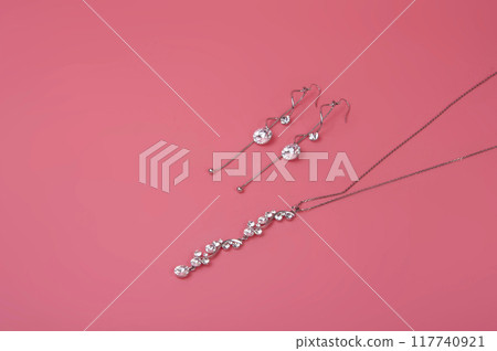 vintage elegant jewelry on pink background vintage elegant jewelry on pink background 117740921