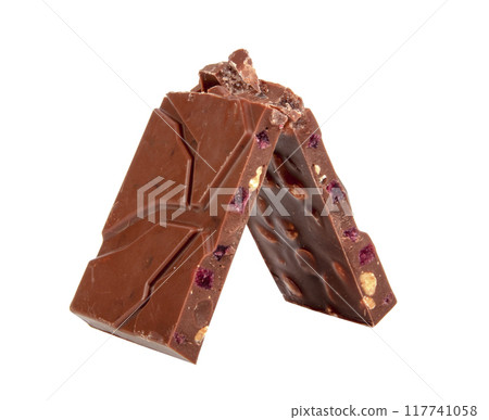 milk chocolate with nuts and berries brocken isolated on the white 117741058