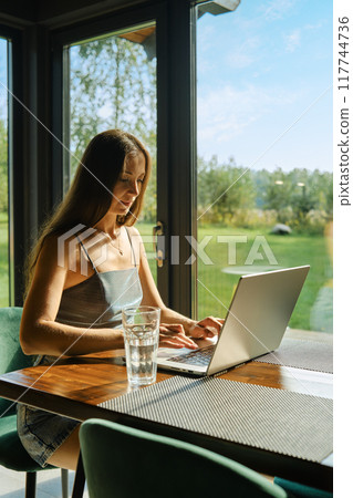 Concept of remote work, workspace tranquility and technology use in natural settings Concept of remote work, workspace tranquility and technology use in natural settings 117744736