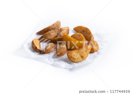 Fried potato wedges isolated on white background. Fried potato wedges isolated on white background. 117744939