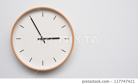 Minimalist wooden Wall Clock on White Wooden Surface with Space for Text. Time Set at 14.55, 02.55 Minimalist wooden Wall Clock on White Wooden Surface with Space for Text. Time Set at 14.55, 02.55 117747421