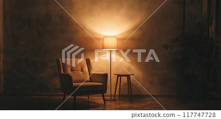 A lamp and a chair in a slightly dimly lit room 117747728