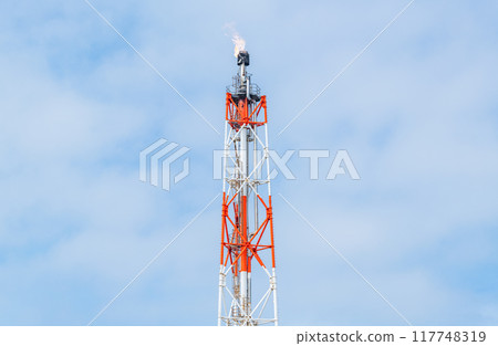 A steel tower that raises a flare stack (flame) 117748319