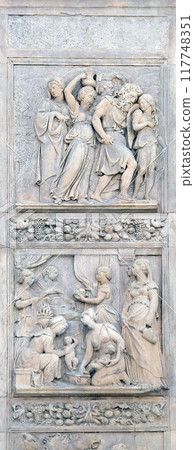 Escape of Loth by Niccolo Tribolo up and Birth of Esau and Jacob by Alfonso Lombardi down, left door of San Petronio Basilica in Bologna, Italy 117748351