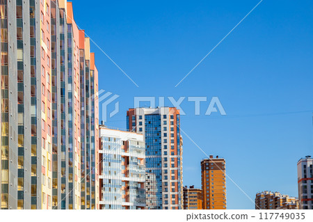 different types of multi-storey apartment building on blue sky different types of multi-storey apartment building on blue sky 117749035