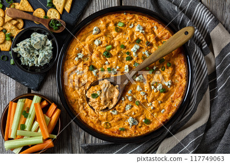 hot buffalo chicken dip in baking dish, top view hot buffalo chicken dip in baking dish, top view 117749063