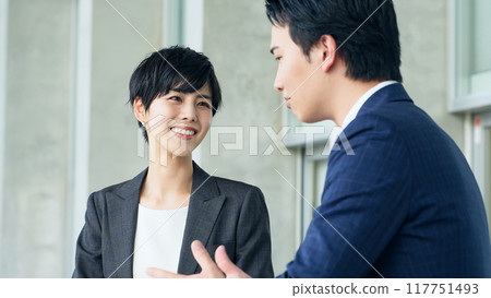 Business person talking in the office Business person talking in the office 117751493