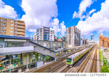 Yokohama cityscape, Japan, August. SOTETSU, overlooking Hiranumabashi Station and trains Yokohama cityscape, Japan, August. SOTETSU, overlooking Hiranumabashi Station and trains 117752453