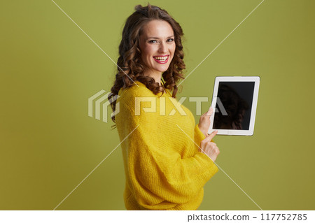 happy healthy woman digital tablet blank screen against green 117752785