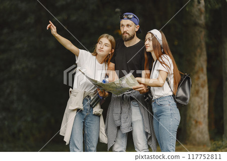Adventure, travel, tourism, hike and people concept. Couple in a forest. Adventure, travel, tourism, hike and people concept. Couple in a forest. 117752811