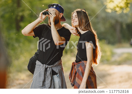 Adventure, travel, tourism, hike and people concept. Couple in a forest. Adventure, travel, tourism, hike and people concept. Couple in a forest. 117752816