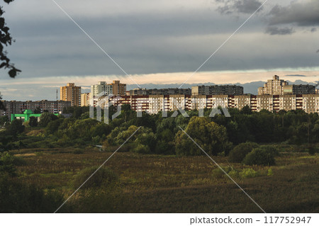 A view of the city from above. View of the city from the park. Fields 117752947