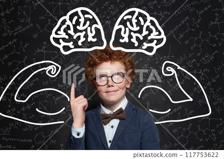Intelligent child boy with brain on blackboard Intelligent child boy with brain on blackboard 117753622