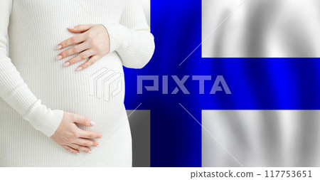 Pregnant woman belly against Finnish flag background. Demographics and pregnancy in Finland concept 117753651