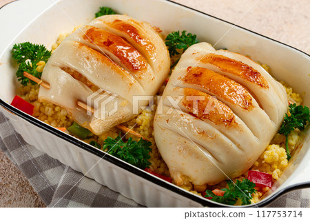 stuffed squid carcasses, baked in the oven, fried, with couscous, top view, homemade, no people, 117753714