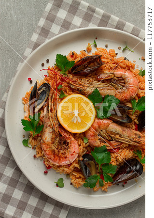 Seafood paella, shrimp and mussels risotto, rice, homemade, top view, no people, Seafood paella, shrimp and mussels risotto, rice, homemade, top view, no people, 117753717