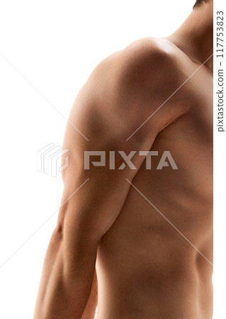 Close-up of man's torso as he bends, highlighting his defined abdominal muscles and tension in his body during stretch. 117753823
