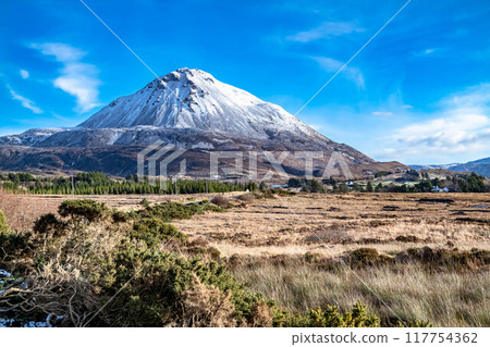 Aerial view of Mount Errigal in the winter, the highest mountain in Donegal - Ireland. Aerial view of Mount Errigal in the winter, the highest mountain in Donegal - Ireland. 117754362