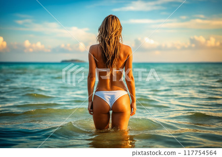 Beautiful body. Sexy blond girl in Sea. woman vacation 117754564