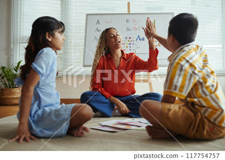 Teaching Alphabet to Children in Bright Classroom Teaching Alphabet to Children in Bright Classroom 117754757