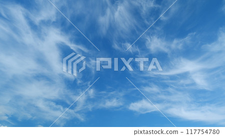 Sky with bautiful silky clouds. Puffy fluffy cumulus or cirrocumulus clouds. Timelapse. 117754780