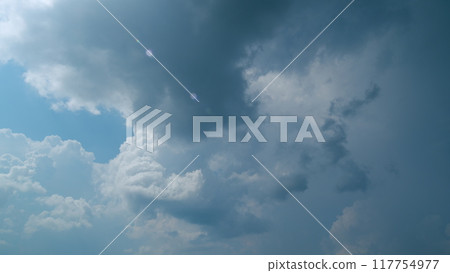 Cumulus cloud cloudscape. Slow rolling clouds. Filming of cumulonimbus cloud movement. Timelapse. Cumulus cloud cloudscape. Slow rolling clouds. Filming of cumulonimbus cloud movement. Timelapse. 117754977