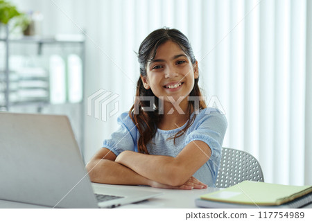 Portrait of Smiling Young Girl Working on Laptop Computer Portrait of Smiling Young Girl Working on Laptop Computer 117754989