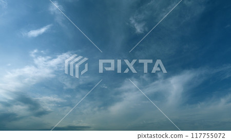 Blue heaven summer cloudscape. Rolling puffy white layered clouds are moving. Timelapse. 117755072