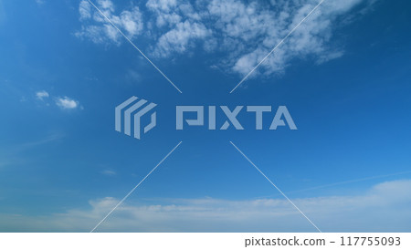Nature weather blue sky. Clouds with blue light blue sky in horizon. Timelapse. 117755093