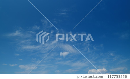 Daylight exotic horizon in tropical summer sunlight. Beautiful sunny blue sky background with tiny cirrus and cumulus on different layers. Timelapse. Daylight exotic horizon in tropical summer sunlight. Beautiful sunny blue sky background with tiny cirrus and cumulus on different layers. Timelapse. 117755256