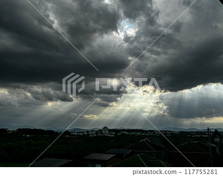 Light through the gaps in the clouds 117755281