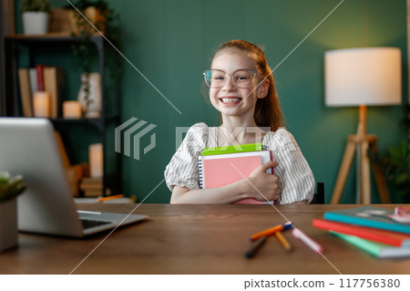 Girl doing homework 117756380