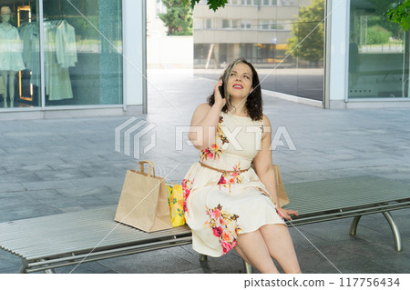 Happy woman shopping Happy woman shopping 117756434
