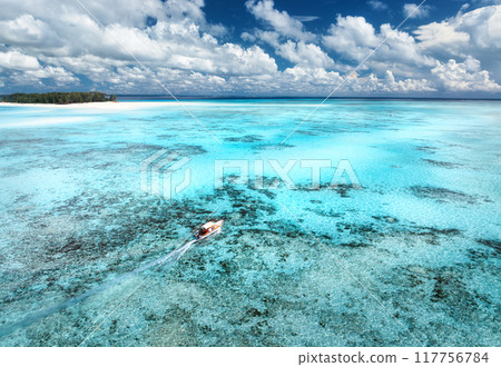 Aerial view of colorful boat, sandbank, blue sea on sunny day Aerial view of colorful boat, sandbank, blue sea on sunny day 117756784