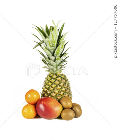 Different tropical fruits lie group on a white background. Different tropical fruits lie group on a white background. 117757006