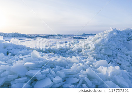 Winter landscape. Ice hummocks covered with snow 117757201