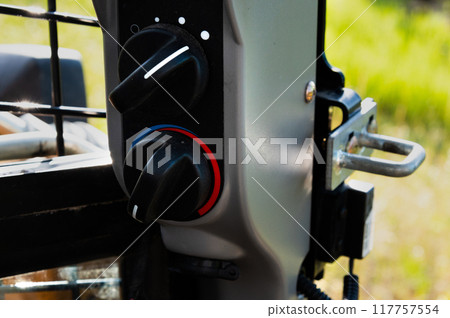 Controls of a small excavator in the cab. Background for special equipment theme concept Controls of a small excavator in the cab. Background for special equipment theme concept 117757554