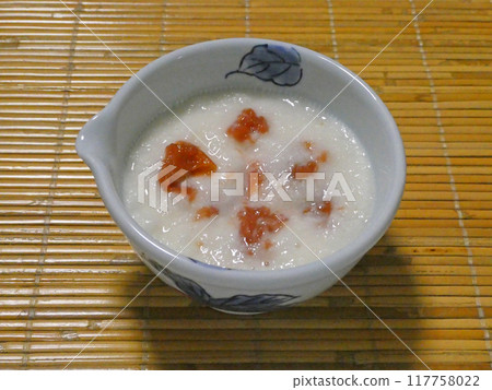 A photo of yam dressed in grated yam and pickled plum, accented by the sourness of the pickled plum A photo of yam dressed in grated yam and pickled plum, accented by the sourness of the pickled plum 117758022
